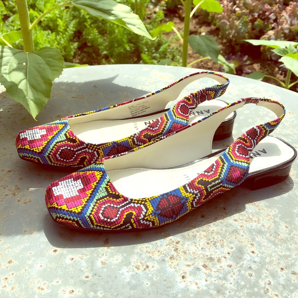 Flat, strap-heel sandals